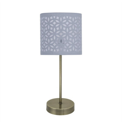 First Choice Lighting Antique Brass Stick Table Lamp With Grey Laser Cut Shade from B&Q