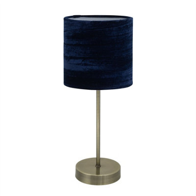 First Choice Lighting Antique Brass Stick Table Lamp With Navy Blue Crushed Velvet Shade from B&Q