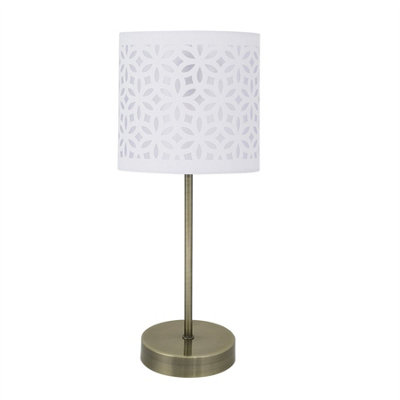 First Choice Lighting Antique Brass Stick Table Lamp With White Laser Cut Shade from B&Q