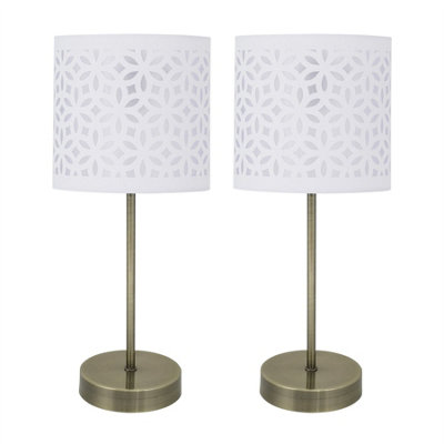 First Choice Lighting Set Of 2 Antique Brass Stick Table Lamps With White Laser Cut Shades from B&Q