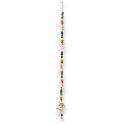 Serenityy Indian Chimes Brass Om With Chakra Beads String Bells 53CmMulticolour390G. from B&Q
