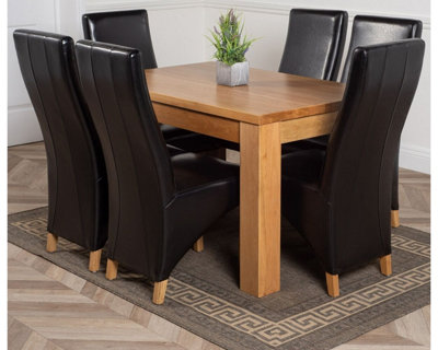 That's Furniture Dakota 127 X 82 Cm Chunky Oak Small Dining Table And 6 Chairs Dining Set With Lola Black Leather Chairs from B&Q