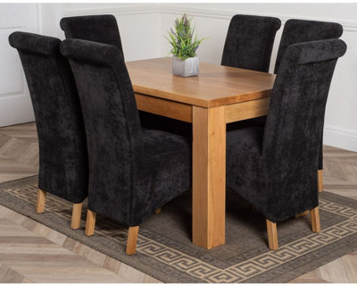 That's Furniture Dakota 127 X 82 Cm Chunky Oak Small Dining Table And 6 Chairs Dining Set With Montana Black Fabric Chairs from B&Q