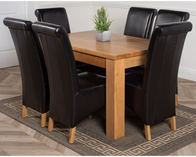That's Furniture Dakota 127 X 82 Cm Chunky Oak Small Dining Table And 6 Chairs Dining Set With Montana Black Leather Chairs from B&Q