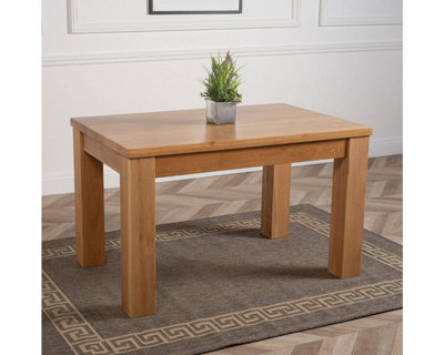 That's Furniture Dakota 127 X 82 Cm Chunky Oak Small Dining Table And 6 Chairs Dining Set With Washington Black Leather Chairs from B&Q