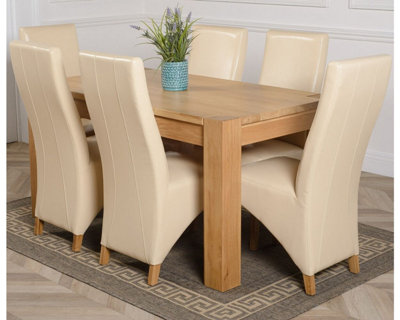 That's Furniture Kuba 150 X 85 Cm Chunky Medium Oak Dining Table And 6 Chairs Dining Set With Lola Ivory Leather Chairs from B&Q