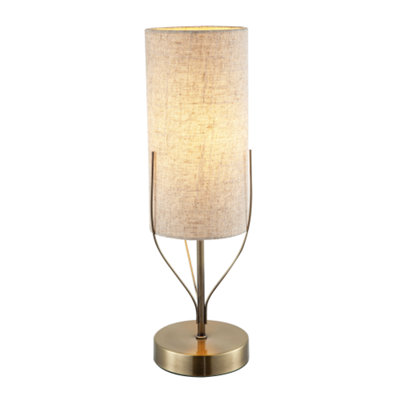 Happy Homewares Sleek Antique Brass Metal Table Lamp With Cylindrical Linen Shade from B&Q