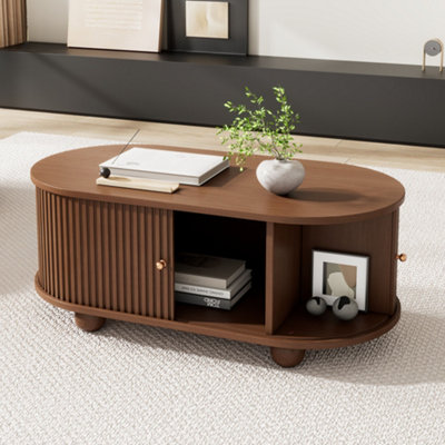 Btm Oval Coffee Table With 2 Sliding DoorsRounded CornersHidden CompartmentCentral Open Storage100X50X40 CmOak Mdf