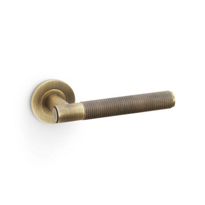 Alexander & Wilks Spitfire Knurled Lever On Round RoseAntique Brass from B&Q