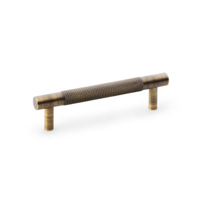 Alexander & Wilks Brunel Knurled T-Bar Cupboard HandleAntique BrassCentres 96mm from B&Q