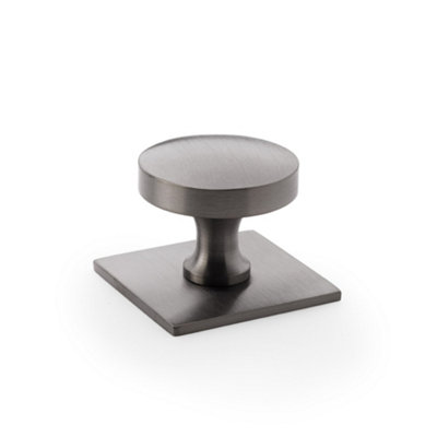 Alexander & Wilks Bullion Cupboard Knob On Square BackplateDark Bronze Pvd from B&Q