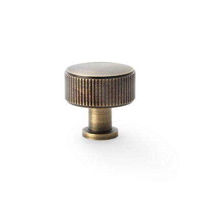 Alexander & Wilks Lucia Reeded Cupboard KnobAntique Brass35mm from B&Q