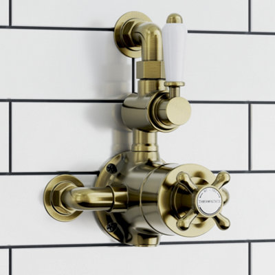 Enki Downton Antique Brass White Traditional Bathroom Ceramic Thermostatic Twin Valve Crosshead Return To Wall Shower Mixer Unit from B&Q