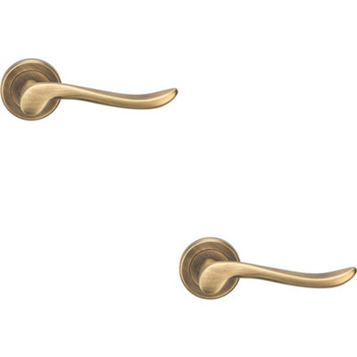 2X Pair Scroll Shaped Lever Handle On Round Rose Concealed Fix Antique Brass from B&Q