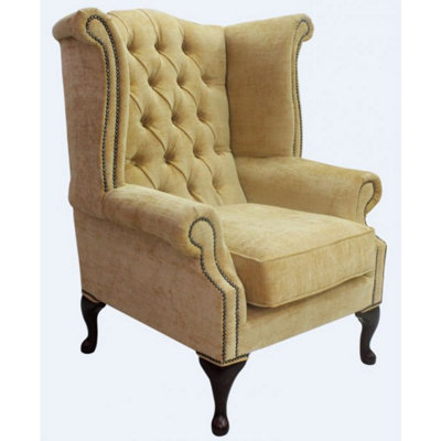 Chesterfield High Back Wing Chair Velluto Gold Fabric In Queen Anne Style from B&Q
