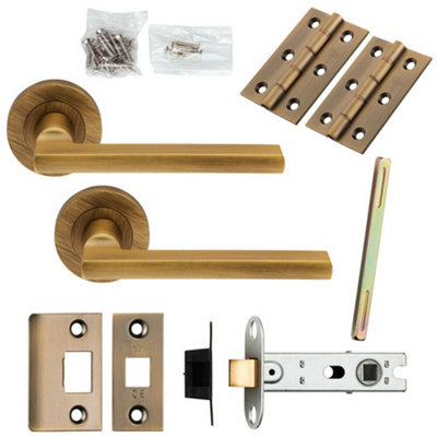  - Door Handle & Latch Pack Antique Brass Plinth Mounted Bar Screwless Round Rose
