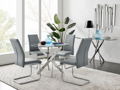 Furniturebox Novara Clear Tempered Glass 100Cm Round Dining Table With Chrome Starburst Legs & 4 Lorenzo Faux Leather Chairs Grey
