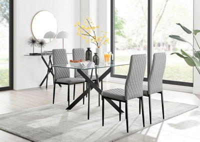 Furniturebox Leonardo 4 Seater Rectangular Glass Dining Table With Silver Metal Legs & 4 Grey Milan Faux Leather Black Leg Chairs from B&Q