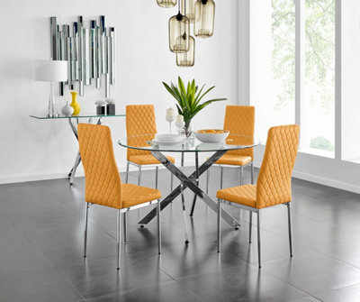 Furniturebox Novara Clear Tempered Glass 120Cm Round Dining Table With Chrome Starburst Legs & 4 Mustard Milan Faux Leather Chairs from B&Q