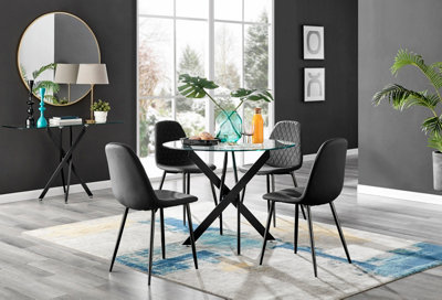 Furniturebox Novara Clear Tempered Glass 100Cm Round Dining Table With Black Starburst Legs & 4 Black Corona Faux Leather Chairs from B&Q