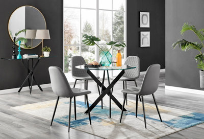 Furniturebox Novara Clear Tempered Glass 100Cm Round Dining Table With Black Starburst Legs & 4 Grey Corona Faux Leather Chairs from B&Q
