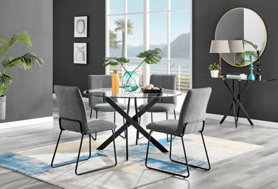 Furniturebox Novara Clear Tempered Glass 120Cm Round Dining Table With Black Starburst Legs & 4 Dark Grey Halle Soft Fabric Chairs from B&Q