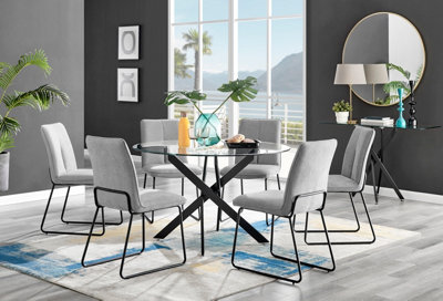Furniturebox Novara Clear Tempered Glass 120Cm Round Dining Table With Black Starburst Legs & 6 Cream Halle Soft Fabric Chairs from B&Q