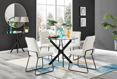 Furniturebox Novara Clear Tempered Glass 100Cm Round Dining Table With Black Starburst Legs & 4 Cream Halle Soft Fabric Chairs from B&Q