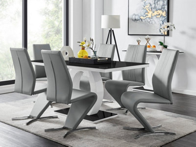 Furniturebox Giovani Rectangular 6 Seat White High Gloss Halo Structural Dining Table Black Glass Top And 6 Grey Faux Leather Willow Chairs from B&Q