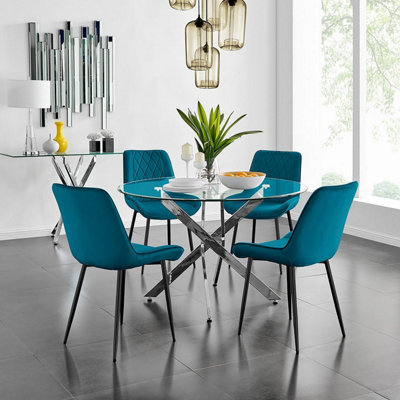 Furniturebox Uk Novara 120Cm Round Dining Table And 4 Blue Pesaro Black Leg Chairs from B&Q
