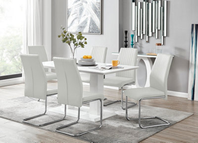Furniturebox Imperia White High Gloss 6 Seater Dining Table With Structural 2 Plinth Column Legs 6 White Faux Leather Lorenzo Cantilever Chairs from B&Q