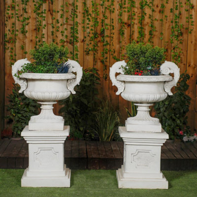  - Pair Of Large Edwardian Stone Vase On Plinths