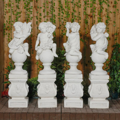 White Stone Cast Four Seasons Cherub Statues (Plinths Not Included) from B&Q