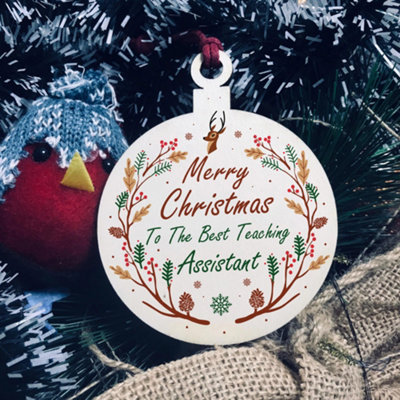 Red Ocean Merry Christmas To The Best Teaching Assistant Hanging Bauble Tree Decoration from B&Q