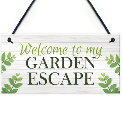 Red Ocean Garden Signs And Plaques Garden Escape Sign Summerhouse Shed Decking Sign from B&Q