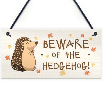 Red Ocean Beware Of The Hedgehog Funny Garden Sign Hedgehog Sign Family Gift Home Decor Plaque from B&Q