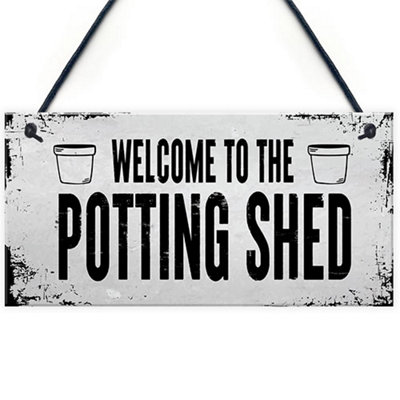 Red Ocean Welcome To The Potting Shed Sign Novelty Garden Sign Shed Summerhouse Sign Greenhouse Sign Home Decor from B&Q