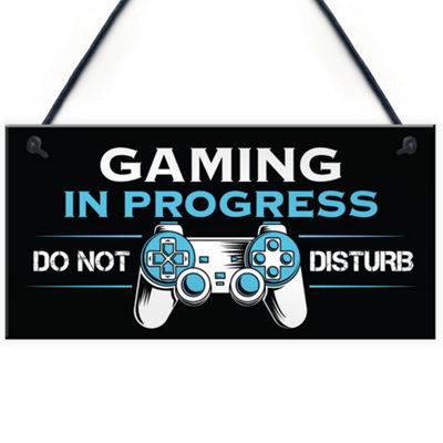 Red Ocean Gaming In Progress Gamer Gift Gaming Sign For Boys Bedroom Novelty Games Room Sign Gift For Son Brother from B&Q