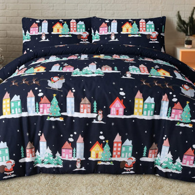 Smart Living Cozy Christmas Santa Town Festive Reversible Duvet Cover With Pillowcase from B&Q