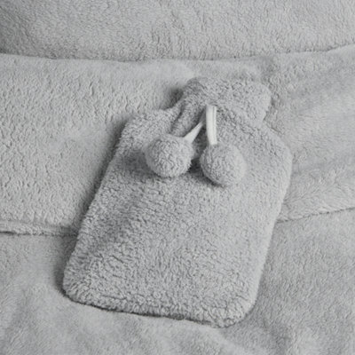 Soft And Luxurious Hot Water Bottle With Fleece Pompom CoverGrey from B&Q