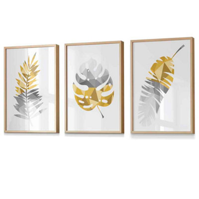 Artze Wall Art Set Of 3 Geometric Yellow Grey Tropical Leaves Wall Art Prints / 42X59Cm (A2) / Oak Frame from B&Q