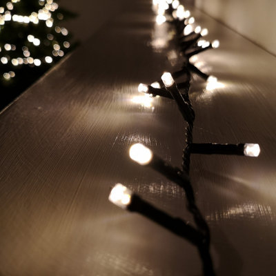 Samuel Alexander White 1000 Led Indoor Outdoor Christmas Multi Function Mains Operated String Lights With Timer In In Warm 25M