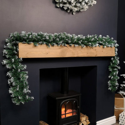 Samuel Alexander 2.7M Snowy Green Christmas Garland With 260 Snow Tipped Christmas Garland Decoration from B&Q
