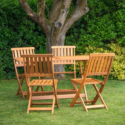 Samuel Alexander Outdoor 4 Person Folding Rectangular Wooden Garden Patio Dining Table Chairs Set from B&Q