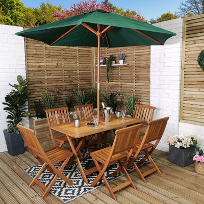 Samuel Alexander Outdoor 6 Person Folding Rectangular Wooden Garden Dining Table Chairs Parasol And Base Set from B&Q