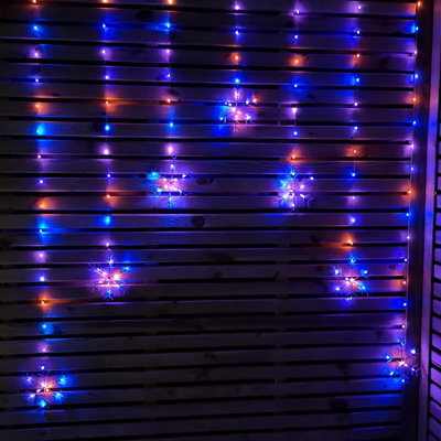 Samuel Alexander 1.2M Battery Operated Snowflake Curtain Christmas Lights With 147 Rainbow Leds Silver
