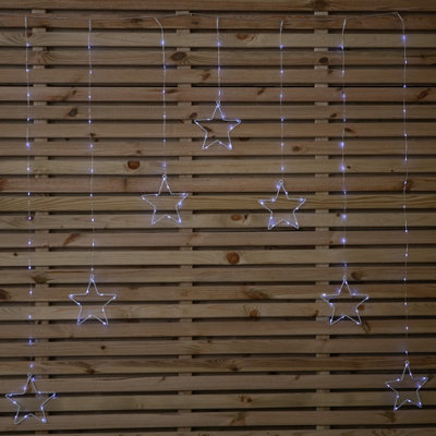 Samuel Alexander 1.2M Battery Operated Christmas Star Curtain Lights With 140 White Leds from B&Q