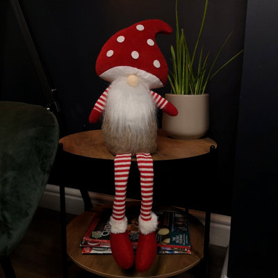 Samuel Alexander 53Cm Stripey Red Plush Sitting Christmas Boy Gonk With Dangly Legs And Mushroom Hat from B&Q