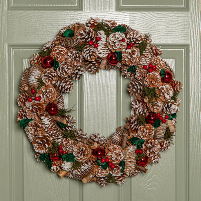Samuel Alexander 50Cm Hanging Christmas Yulefest Wreath With Red Baubles & Snow Tipped Pine Cones from B&Q