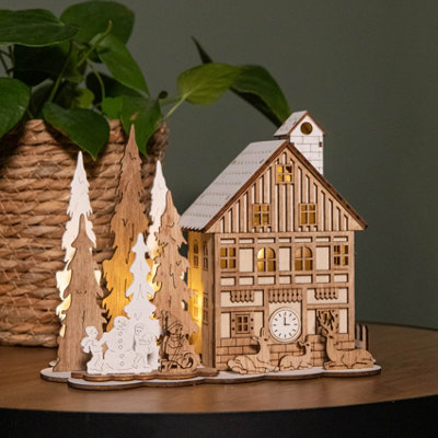 Samuel Alexander 16Cm Battery Operated Light Up Wooden House Scene With Christmas Trees And Warm White Leds from B&Q